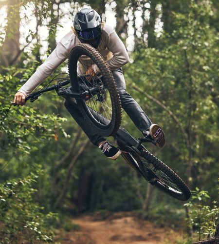 sports-adventure-and-forest-with-man-and-mountain-biking-on-park-trail-for-action-freedom-and-fit.jpg